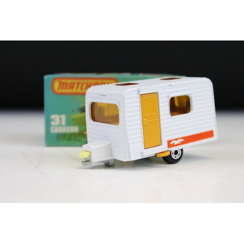 1448 - Ex Shop Stock - 12 boxed Matchbox 75 Series diecast models to include 25 Flat Car/Container, 66 Tyro... 