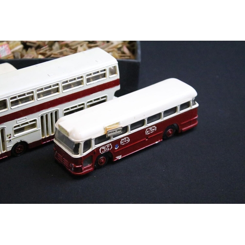 1114 - Over 60 diecast models, mostly mid 20th C buses, showing heavy repainting, to include Dinky, Budgie ... 