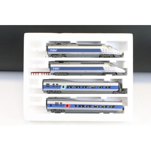 16 - Two boxed OO gauge train packs to include Lima 149714 TGV set and Hornby R794 Advanced Passenger Tra... 