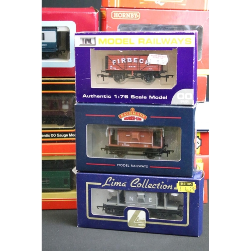 30 - 37 Boxed OO gauge items of rolling stock to include 30 x Hornby / Triang, 2 x Bachmann, 2 x Dapol, 1... 