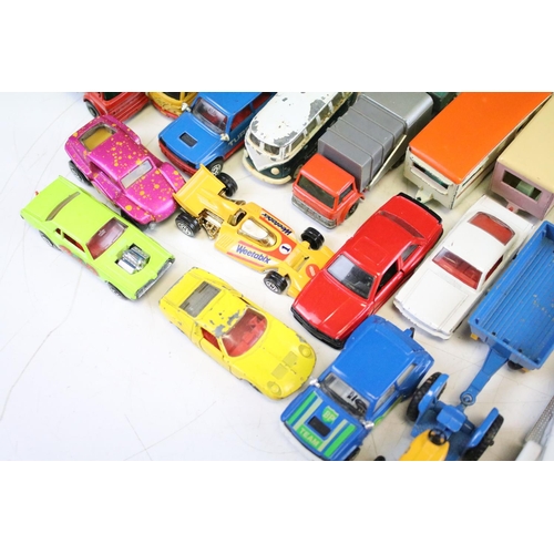 1214 - Around 90 mid 20th C onwards play worn diecast models to include Matchbox & Corgi examples, featurin... 