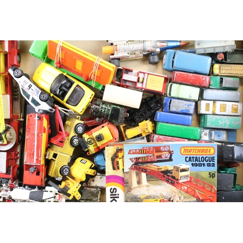 1214 - Around 90 mid 20th C onwards play worn diecast models to include Matchbox & Corgi examples, featurin... 