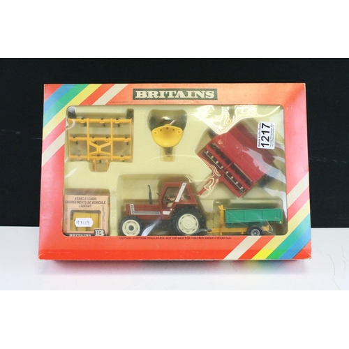 1217 - Boxed Britains 9591 Fiat Tractor and Implement Set appearing to be complete, models ex, box vg with ... 