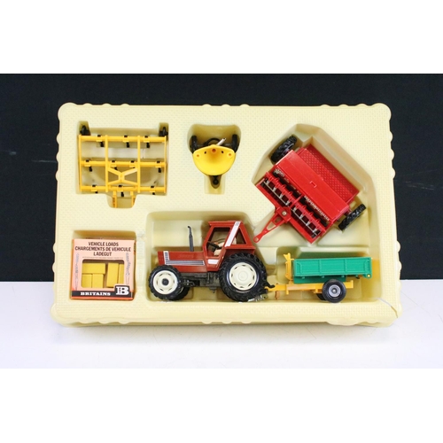 1217 - Boxed Britains 9591 Fiat Tractor and Implement Set appearing to be complete, models ex, box vg with ... 