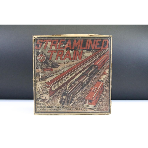 57 - Boxed Marx Streamlined clockwork train set with locomotive, 4 x items of rolling stock and track