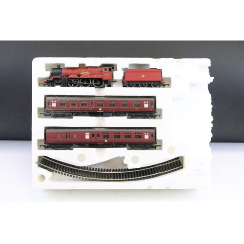 59 - Hornby OO gauge Harry Potter Hogwarts Express locomotive, 2 x coaches and 4 x items of track contain... 