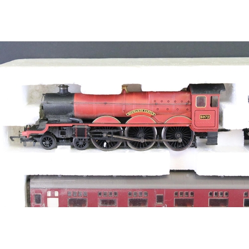 59 - Hornby OO gauge Harry Potter Hogwarts Express locomotive, 2 x coaches and 4 x items of track contain... 