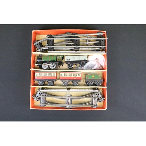 75 - Boxed Hornby O gauge Clockwork Passenger Set No 21 with locomotive, rolling stock and track plus a b... 