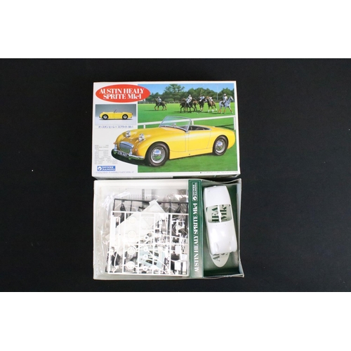 142 - Collection of four boxed radio control and plastic model kit sets, to include 2 x plastic model kits... 