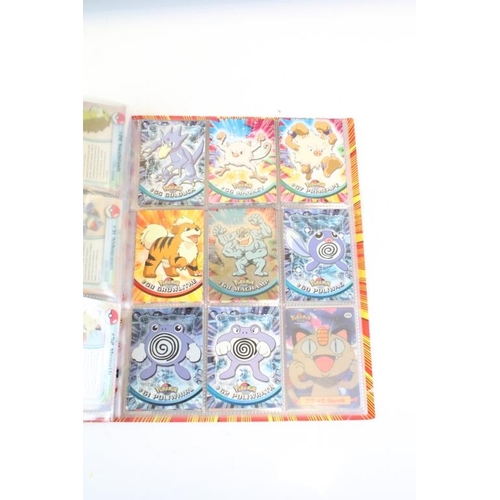 265 - Pokémon - Collection of Pokémon related items to include Topps Pokémon Trading Cards contained withi... 