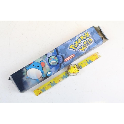 265 - Pokémon - Collection of Pokémon related items to include Topps Pokémon Trading Cards contained withi... 