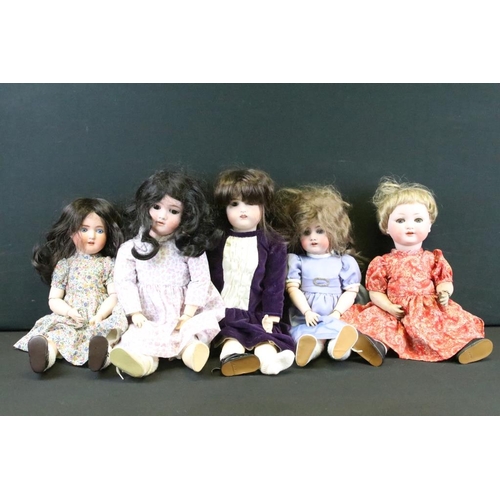 1576 - Group of five German bisque girl dolls all having hand painted features, composite bodies, and glass... 