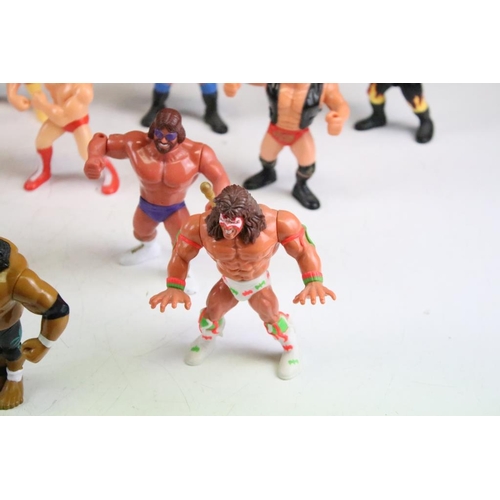 484 - WWF / WWE Wrestling - 12 Hasbro WWF figures to include Macho Man Randy Savage with sector, Mr Perfec... 