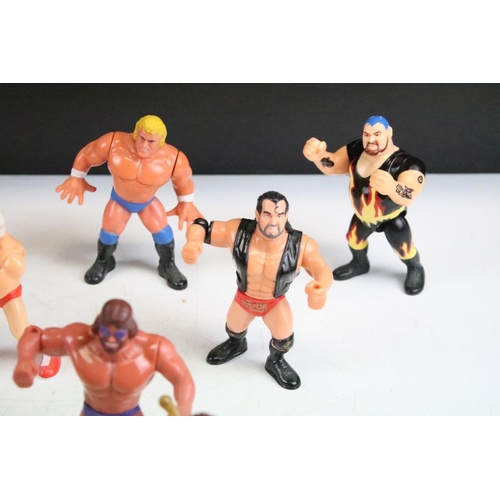 484 - WWF / WWE Wrestling - 12 Hasbro WWF figures to include Macho Man Randy Savage with sector, Mr Perfec... 