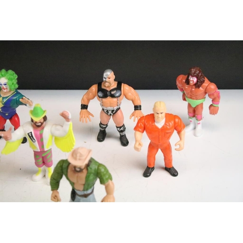 485 - WWF / WWE Wrestling - 12 Hasbro WWF figures to include Rick the model Martel, The Warlord, Crush (pu... 