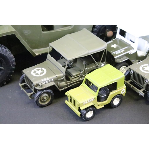 404 - Collection of 13 diecast, tinplate & plastic USA military jeep models, of varying scales, to include... 