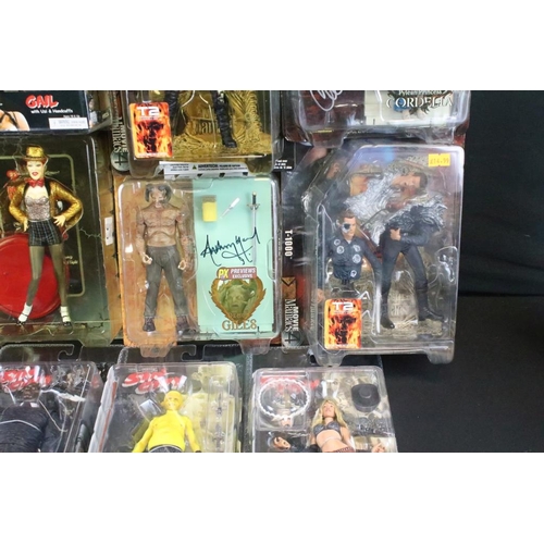 417 - Collection of 14 various carded and boxed TV and film related action figures to include 4 x signed c... 