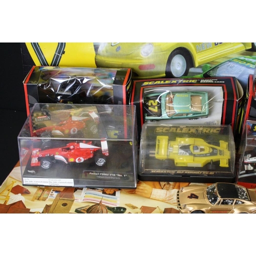 243 - Collection of various boxed and unboxed Scalextric to include boxed Beetle Cup, boxed Advanced Track... 