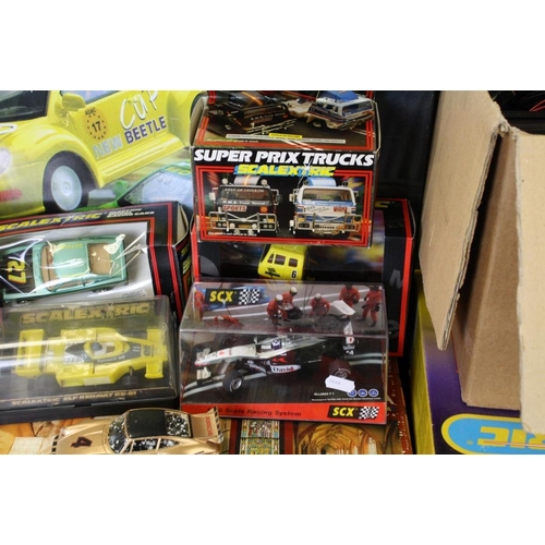 243 - Collection of various boxed and unboxed Scalextric to include boxed Beetle Cup, boxed Advanced Track... 