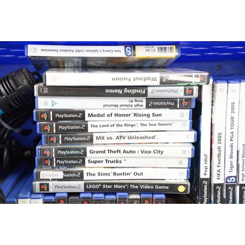 375 - Retro Gaming - A PS2 PlayStation 2 games console with 53 cased PS2 games (Medal Of Honor Rising Sun,... 