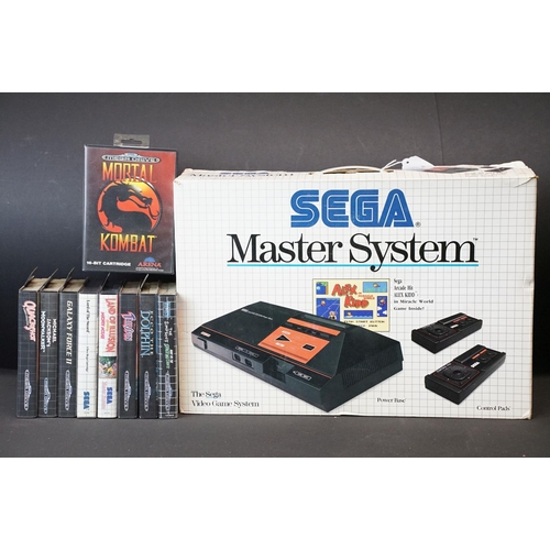 383 - Retro Gaming - A boxed Sega Master System console with control pads & power supply (missing game), t... 