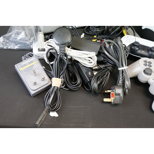 384 - Retro Gaming - Three Sony PlayStation consoles to include PSOne, PS1 & PS4 (model CUH-2116A); togeth... 