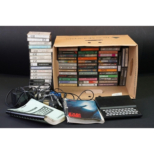 385 - Retro Gaming - A Sinclair ZX81 games console with over 65 cased game cassettes (ZX81 Labyrinth, Rock... 