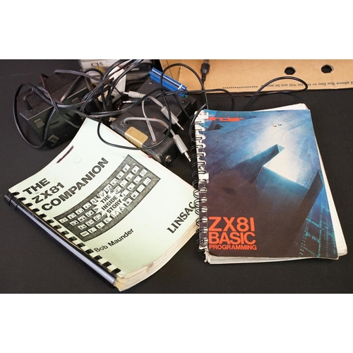 385 - Retro Gaming - A Sinclair ZX81 games console with over 65 cased game cassettes (ZX81 Labyrinth, Rock... 