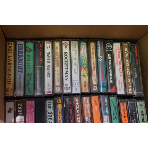 385 - Retro Gaming - A Sinclair ZX81 games console with over 65 cased game cassettes (ZX81 Labyrinth, Rock... 