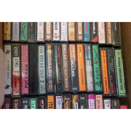 385 - Retro Gaming - A Sinclair ZX81 games console with over 65 cased game cassettes (ZX81 Labyrinth, Rock... 