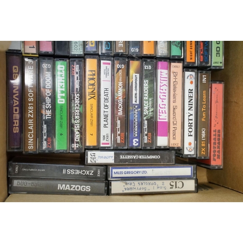 385 - Retro Gaming - A Sinclair ZX81 games console with over 65 cased game cassettes (ZX81 Labyrinth, Rock... 