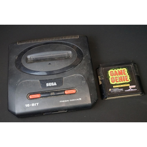 397 - Retro Gaming - Unboxed 16 Bit SEGA Mega Drive games console with SEGA power Supply and other related... 