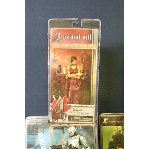 422 - Collection of 11 carded film and gaming related figures to include 5 x Resident Evil 4 figures featu... 