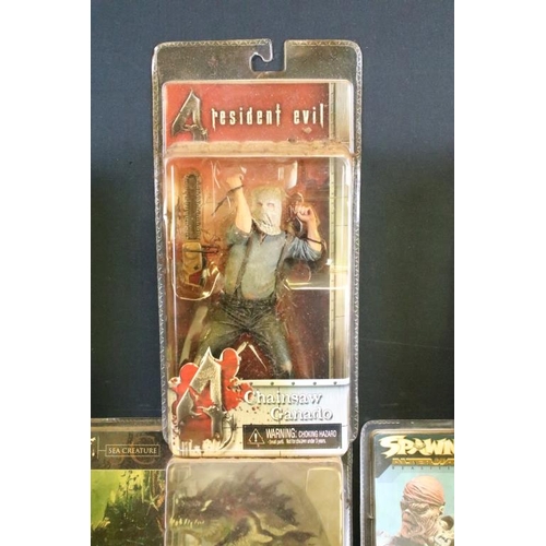 422 - Collection of 11 carded film and gaming related figures to include 5 x Resident Evil 4 figures featu... 