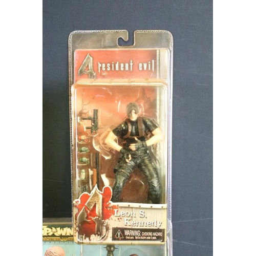 422 - Collection of 11 carded film and gaming related figures to include 5 x Resident Evil 4 figures featu... 