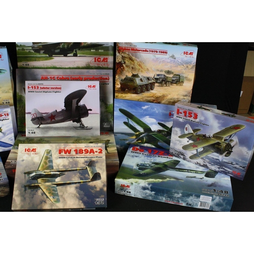 186 - 16 boxed and unbuilt ICM plastic model kits to include 1/32 scale, 1/48 scale, 1/72 scale, 1/35 scal... 