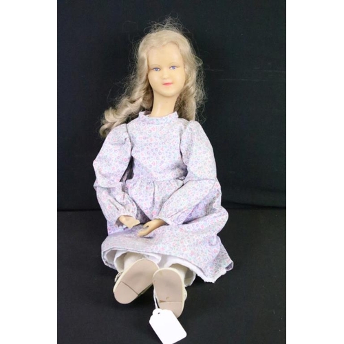 1580 - Three late 19th / early 20th century wax headed dolls to include a doll in a green dress (crack to b... 