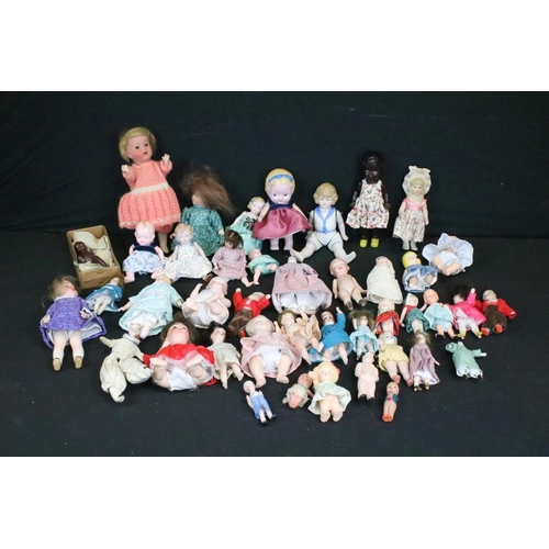 1582 - Collection of small / miniature dolls featuring antique, German, bisque and plastic examples, condit... 