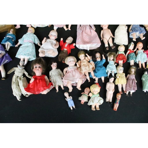 1582 - Collection of small / miniature dolls featuring antique, German, bisque and plastic examples, condit... 