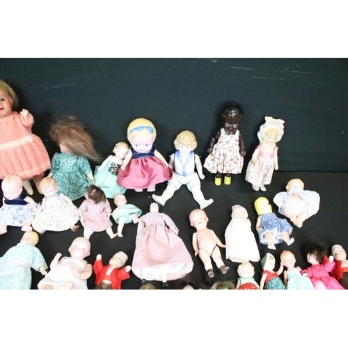 1582 - Collection of small / miniature dolls featuring antique, German, bisque and plastic examples, condit... 