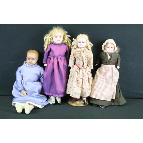 1585 - Four late 19th / early 20th century wax headed dolls with glass eyes and painted facial features, to... 