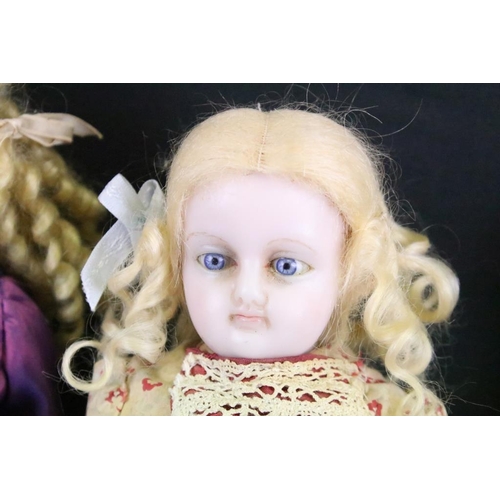 1585 - Four late 19th / early 20th century wax headed dolls with glass eyes and painted facial features, to... 