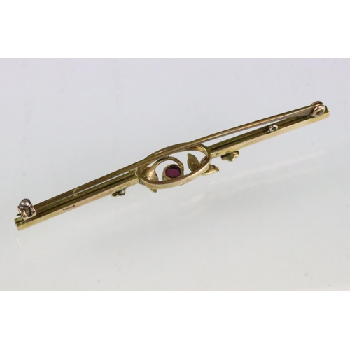 151 - Ruby and seed pearl 9ct yellow gold bar brooch (af) together with an early 20th century yellow metal... 