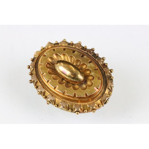 168 - Victorian yellow metal oval brooch, glazed panel verso; an early 20th century banded agate yellow me... 