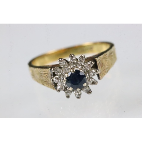 174 - Sapphire and diamond 18ct yellow gold flower head ring, round mixed cut blue sapphire, diameter appr... 