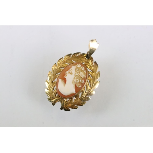 180 - Cameo 9ct yellow gold pendant, the female profile facing left, laurel leaf surround; together with a... 