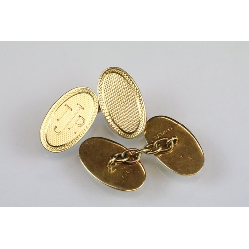 144 - Pair of 18ct yellow gold chain link panel cufflinks, oval engine turned panels, engraved initials