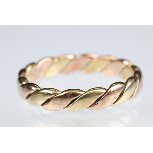 146 - 9ct yellow and rose gold interwoven ring, width approx 3.5mm, ring size Q