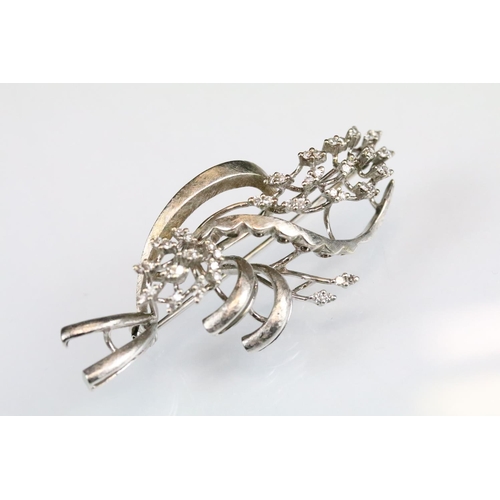 41 - Diamond white metal spray brooch, small round eight cut diamonds, textured stylised leaves, dimensio... 