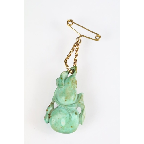 48 - Carved turquoise modelled as a double gourd with leaves, yellow metal belcher link chain suspended f... 